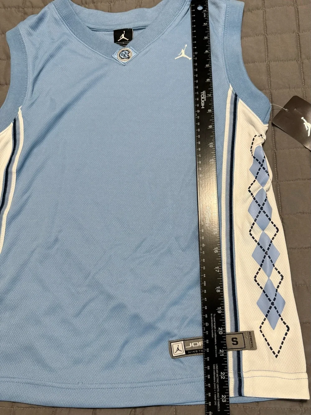 North Carolina tar heels basketball jersey Size Small Jordan Light Blue Vneck